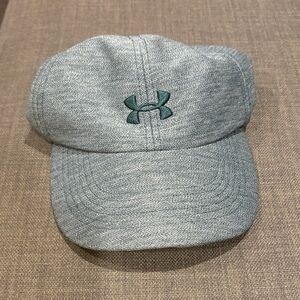 Women’s Under Armour Free Fit Heathered Green Cap with Teal Logo. One size.